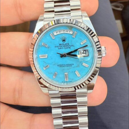 Rolex Day-Date 40mm – Platinum with Turquoise Dial & Baguette Diamond Hour Markers